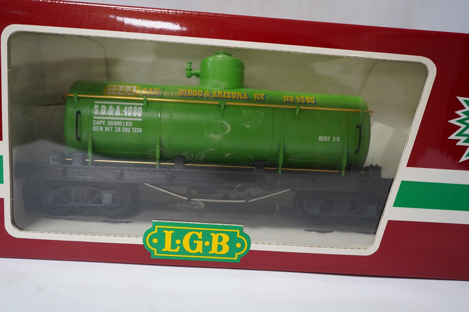 Four boxed Lehmann LGB G scale bogie rolling stock; a tanker (4080-Y 05), a car transporter (4159), And two Denver and Rio Grande Western Railway coaches (3081 and 4075). Condition - good.